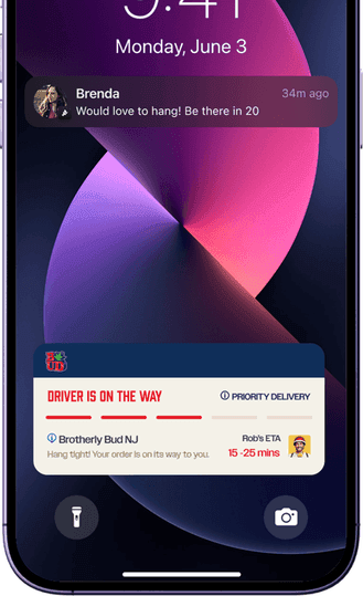 Lock screen live activity showing the driver is on the way with an ETA
